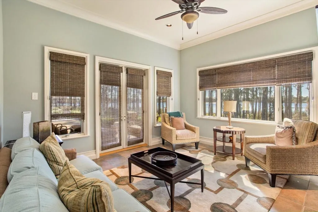 Elegant Isleworth Lakefront Estate With a Hidden Passage and Private Boat Dock Lists for $19,500,000 21 5192 VARDON DRIVE WINDERMERE FL 3478643