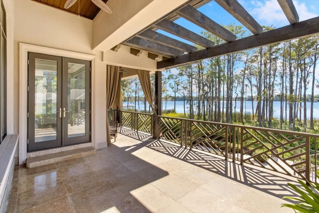 Elegant Isleworth Lakefront Estate With a Hidden Passage and Private Boat Dock Lists for $19,500,000 23 5192 VARDON DRIVE WINDERMERE FL 3478646