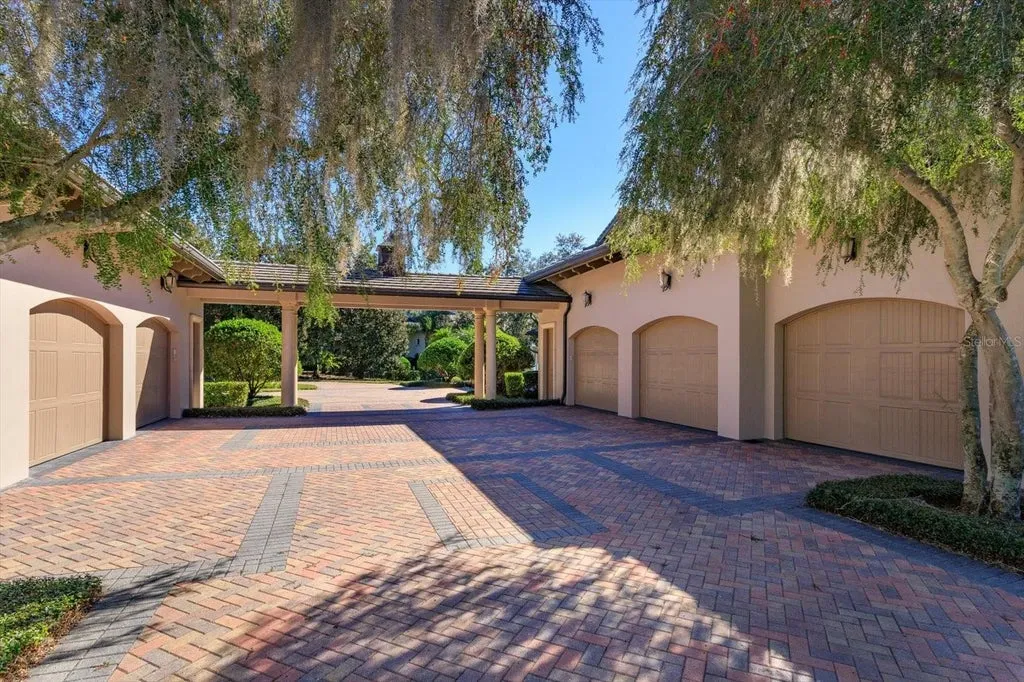 Elegant Isleworth Lakefront Estate With a Hidden Passage and Private Boat Dock Lists for $19,500,000 29 5192 VARDON DRIVE WINDERMERE FL 3478647