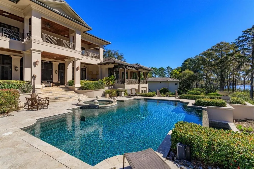 Elegant Isleworth Lakefront Estate With a Hidden Passage and Private Boat Dock Lists for $19,500,000 17 5192 VARDON DRIVE WINDERMERE FL 3478650