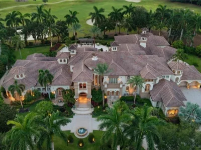 Double-Lakefront Naples Estate With a Hidden Pub Lists for $16 Million 4 Double-Lakefront Naples Estate With a Hidden Pub Lists for $16 Million