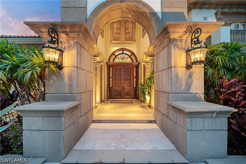 Double-Lakefront Naples Estate With a Hidden Pub Lists for $16 Million 4 9663 Mashie CT NAPLES FL 3410812