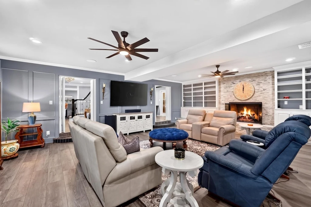 16104 County Road 294 – Stone Fireplace Living Room 16104 County Road 294, Arp: built in shelving flanks the stone fireplace in the spacious living room.