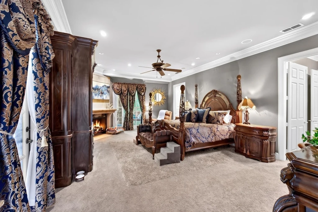 16104 County Road 294 – Primary Bedroom Suite 16104 County Road 294, Arp: the primary bedroom includes a generous sitting area and traditional furnishings.