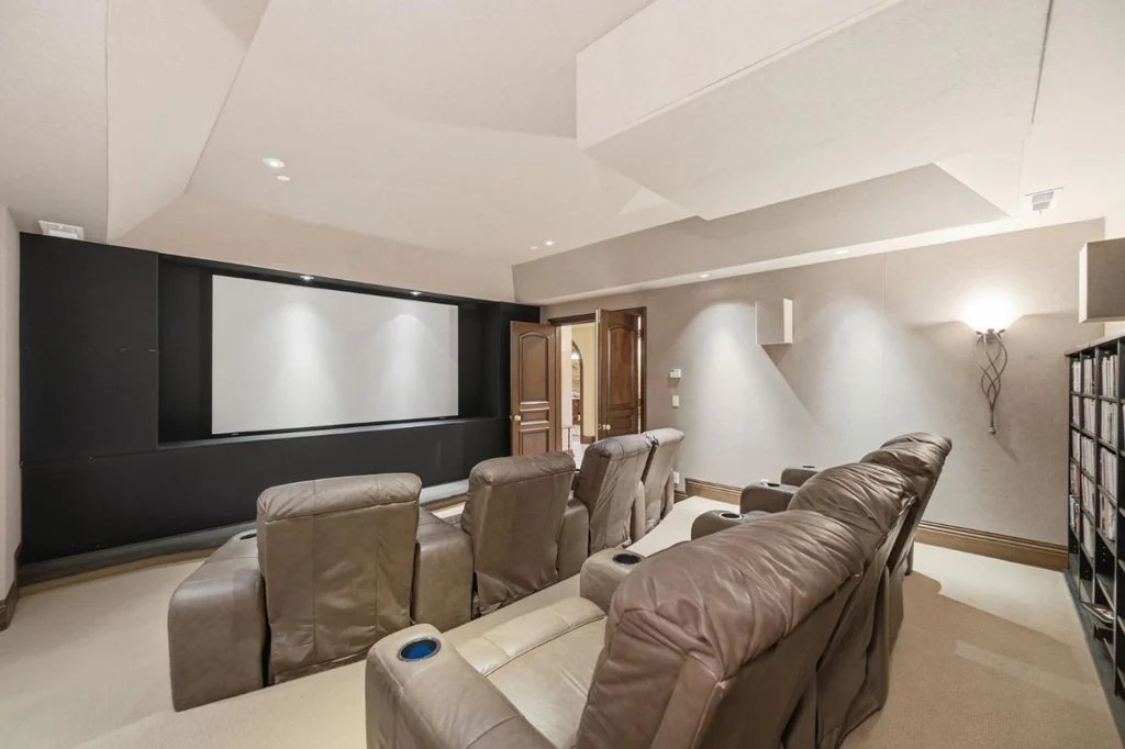 10285 Magdalena Rd – Private Theater 10285 Magdalena Rd, Los Altos Hills: the private theater includes tiered seating facing a large screen.