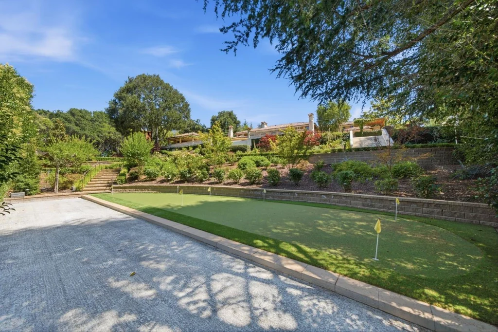 10285 Magdalena Rd – Sports Court 10285 Magdalena Rd, Los Altos Hills: the sports court sits below the house within the terraced landscape.