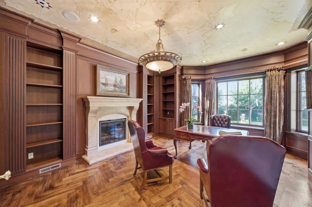 10285 Magdalena Rd – Wood Paneled Office 10285 Magdalena Rd, Los Altos Hills: wood cabinetry and a fireplace create a richly finished office.