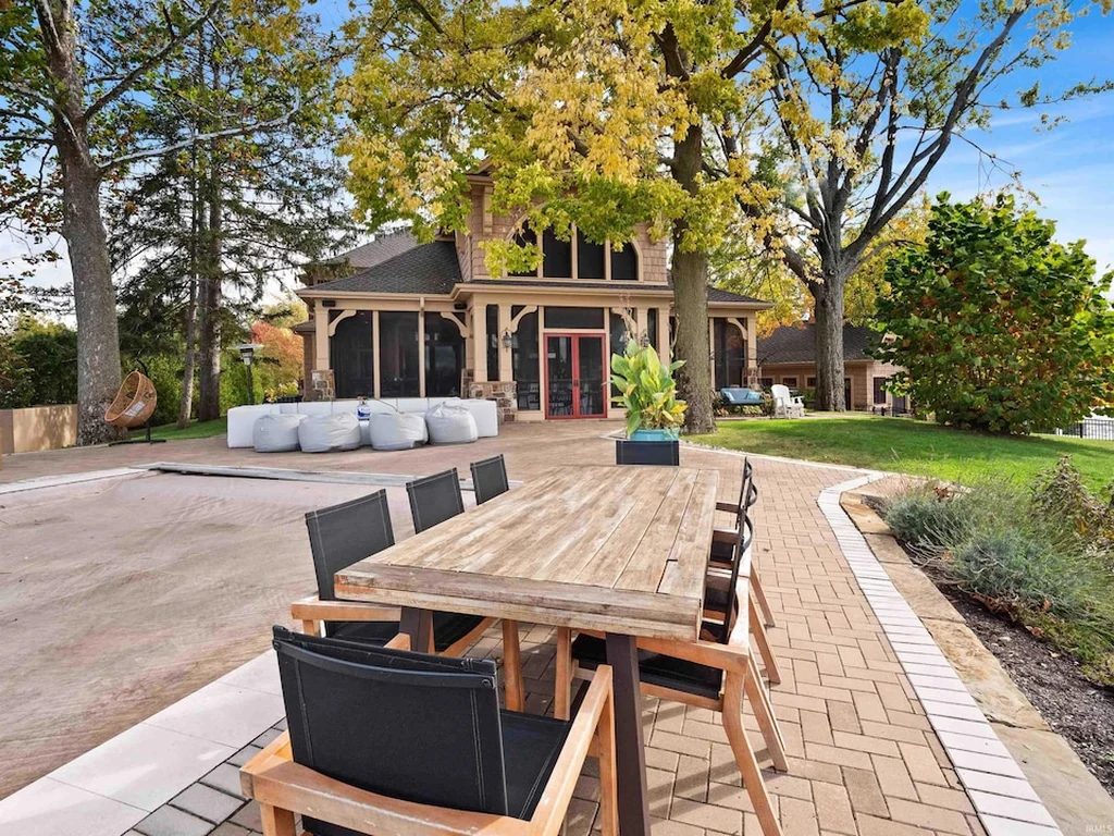 11751 N Black Point Rd – Outdoor Dining and Fire Pit Terrace Outdoor Dining and Fire Pit Terrace at 11751 N Black Point Rd, Syracuse, Indiana