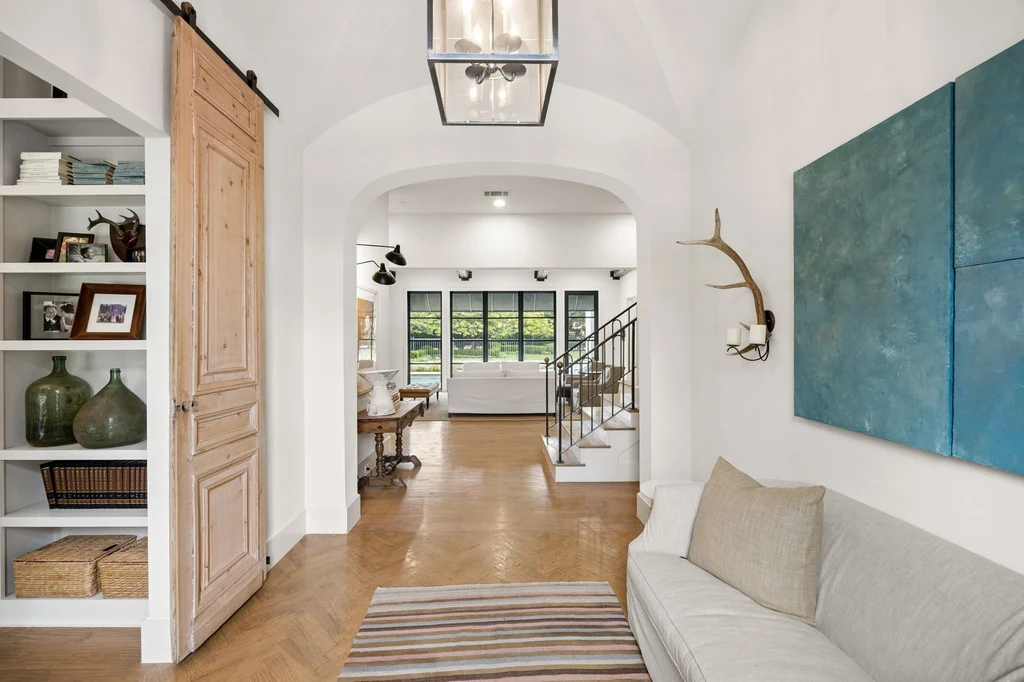 1255 Bolton Ct – Arched Entry Gallery 1255 Bolton Ct, Southlake: a pale wood door and broad arch frame the entrance gallery.