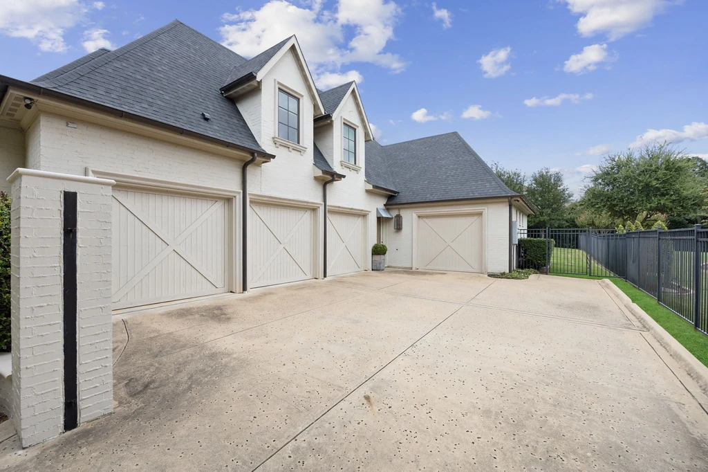 1255 Bolton Ct – Gated Garage Court 1255 Bolton Ct, Southlake: a broad paved parking court serves the garages behind a private gate.