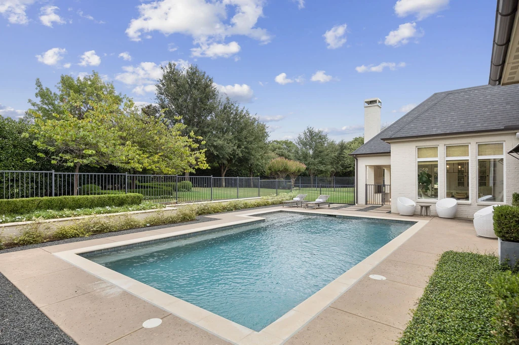 1255 Bolton Ct – Pool Terrace 1255 Bolton Ct, Southlake: a rectangular pool stretches between the residence and the landscaped garden.