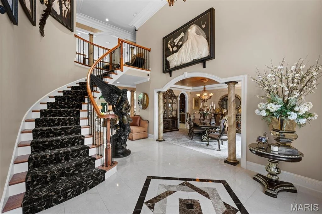 12947 Sunset Bluff Ct – Marble Foyer and Curved Staircase Marble Foyer and Curved Staircase at 12947 Sunset Bluff Ct, Sunset Hills, Missouri