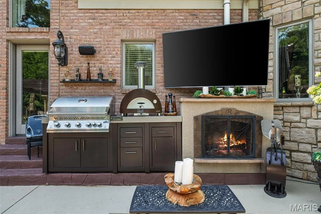 12947 Sunset Bluff Ct – Outdoor Fireplace and Entertainment Station Outdoor Fireplace and Entertainment Station at 12947 Sunset Bluff Ct, Sunset Hills, Missouri