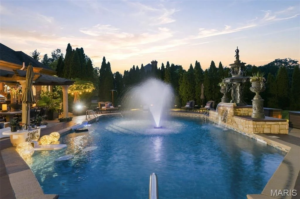 12947 Sunset Bluff Ct – Pool and Fountain at Dusk Pool and Fountain at Dusk at 12947 Sunset Bluff Ct, Sunset Hills, Missouri