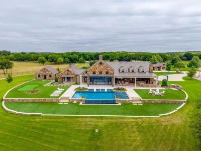 A Texas Estate Built Around Circa-1740 Scottish Timbers Lists for $14,250,000 1 An aerial view places the pool terrace between the stone residence and its open acreage at 13000 Old Weatherford Rd, Aledo