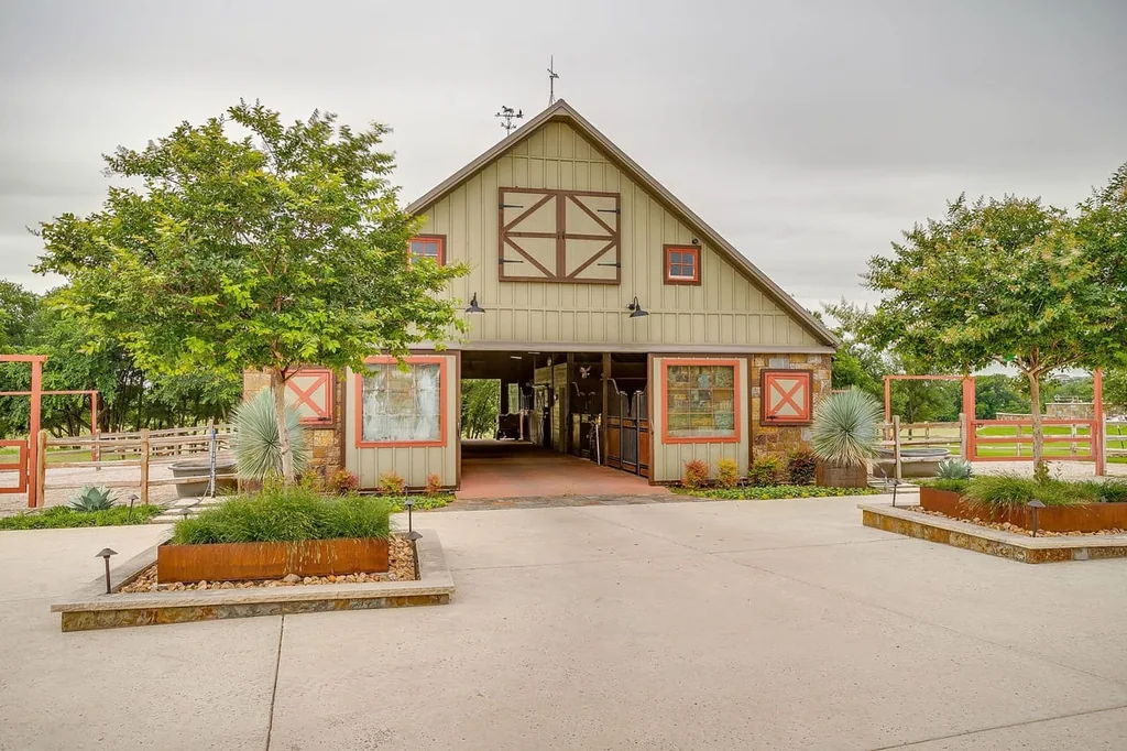 A Texas Estate Built Around Circa-1740 Scottish Timbers Lists for $14,250,000 16 The equestrian barn stands separately from the main residence at 13000 Old Weatherford Rd, Aledo