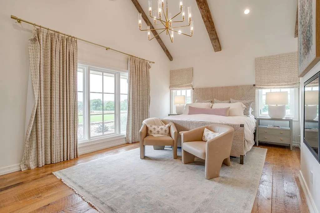 A Texas Estate Built Around Circa-1740 Scottish Timbers Lists for $14,250,000 8 The main-level primary bedroom has a pitched ceiling and views across the grounds at 13000 Old Weatherford Rd, Aledo