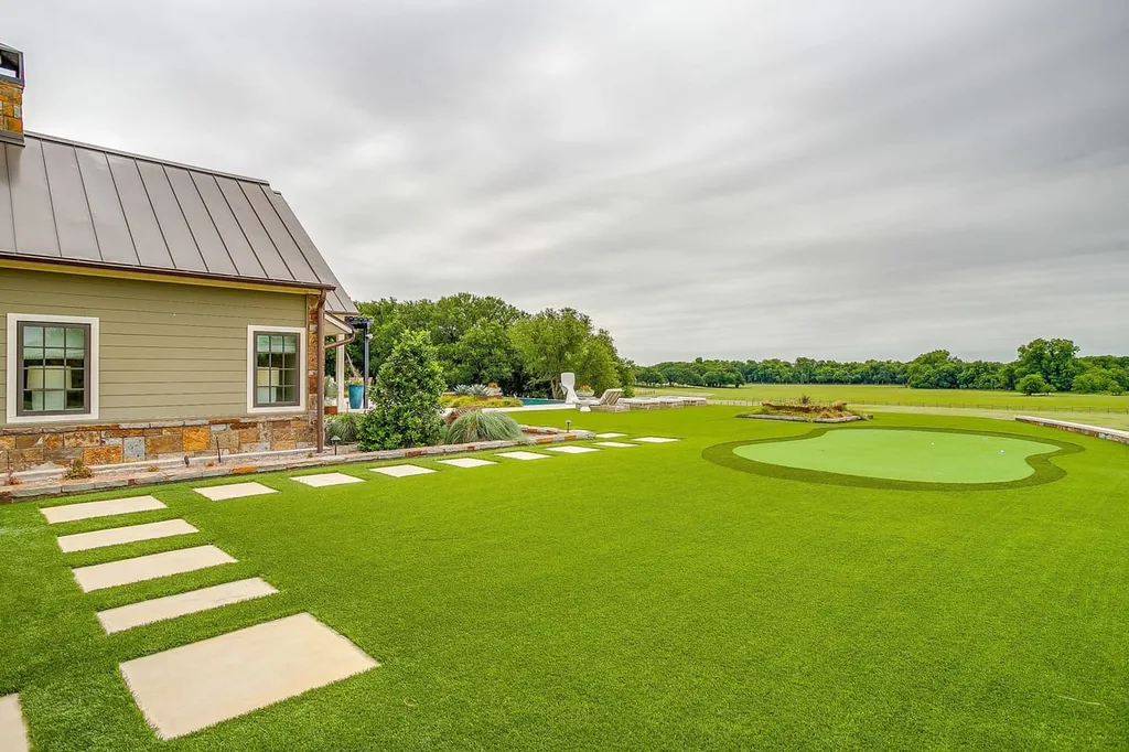 A Texas Estate Built Around Circa-1740 Scottish Timbers Lists for $14,250,000 15 A private putting green sits alongside the residential grounds at 13000 Old Weatherford Rd, Aledo