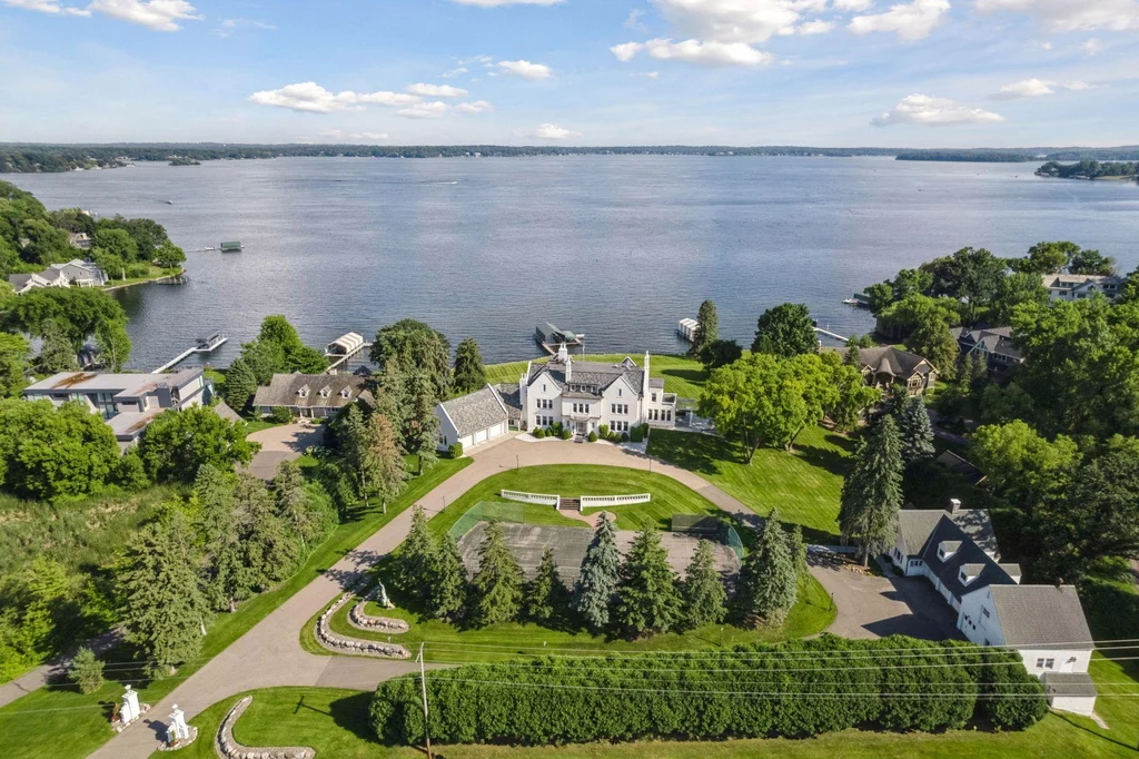 1305 Shoreline Dr — Aerial Lake Minnetonka Estate An aerial view places Old Oaks at 1305 Shoreline Dr between its sweeping entrance drive and Lake Minnetonka.