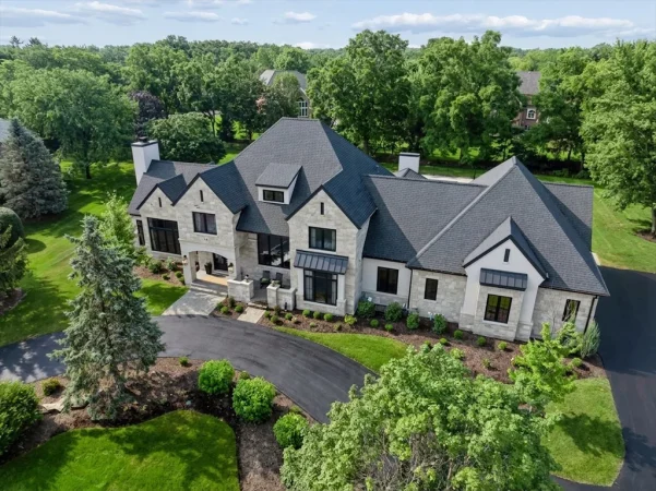 Inverness Estate With a Speakeasy-Style Lounge and Indoor Golf Simulator Lists for $2,750,000