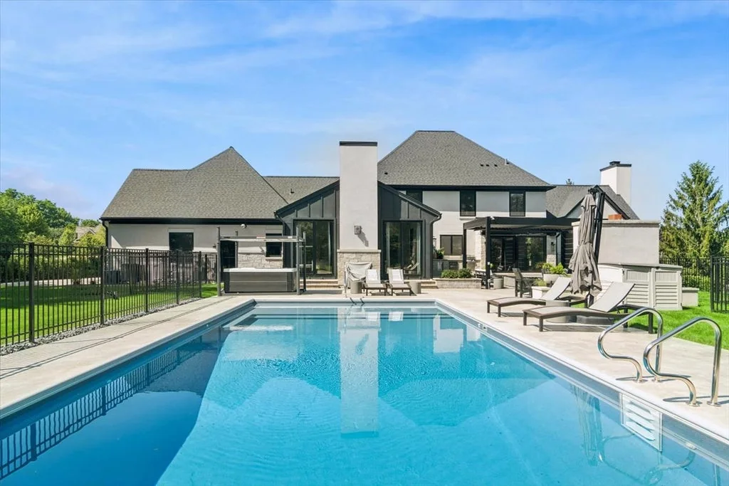 Inverness Estate With a Speakeasy-Style Lounge and Indoor Golf Simulator Lists for $2,750,000 18 Rectangular swimming pool facing the rear of 14 Carnoustie Lane in Inverness, Illinois