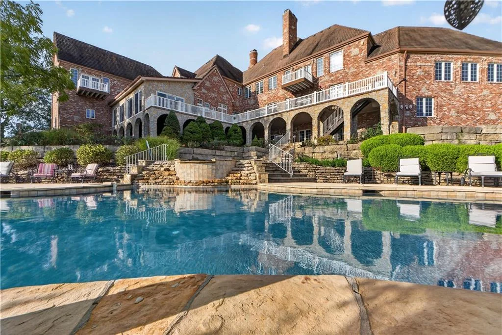 Leawood Estate Bordered by Ironwoods Park on Two Sides Asks $6,500,000 7 A rear arcade faces the swimming pool and garden at 14707 Mission Rd, Leawood