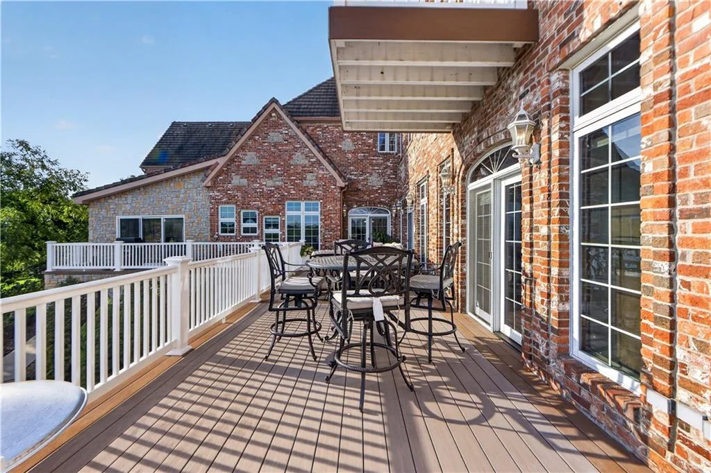 Leawood Estate Bordered by Ironwoods Park on Two Sides Asks $6,500,000 13 An upper-level deck provides an outdoor dining area at 14707 Mission Rd, Leawood