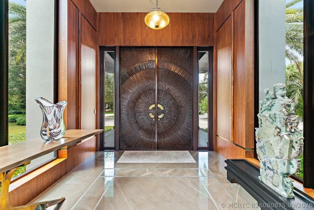 Bespoke Jupiter Estate With a Secluded Garden Spa and Resort-Style Pool Lists for $34,000,000 in The Bear’s Club 3 211 Bears Club Drive Jupiter FL 3347706