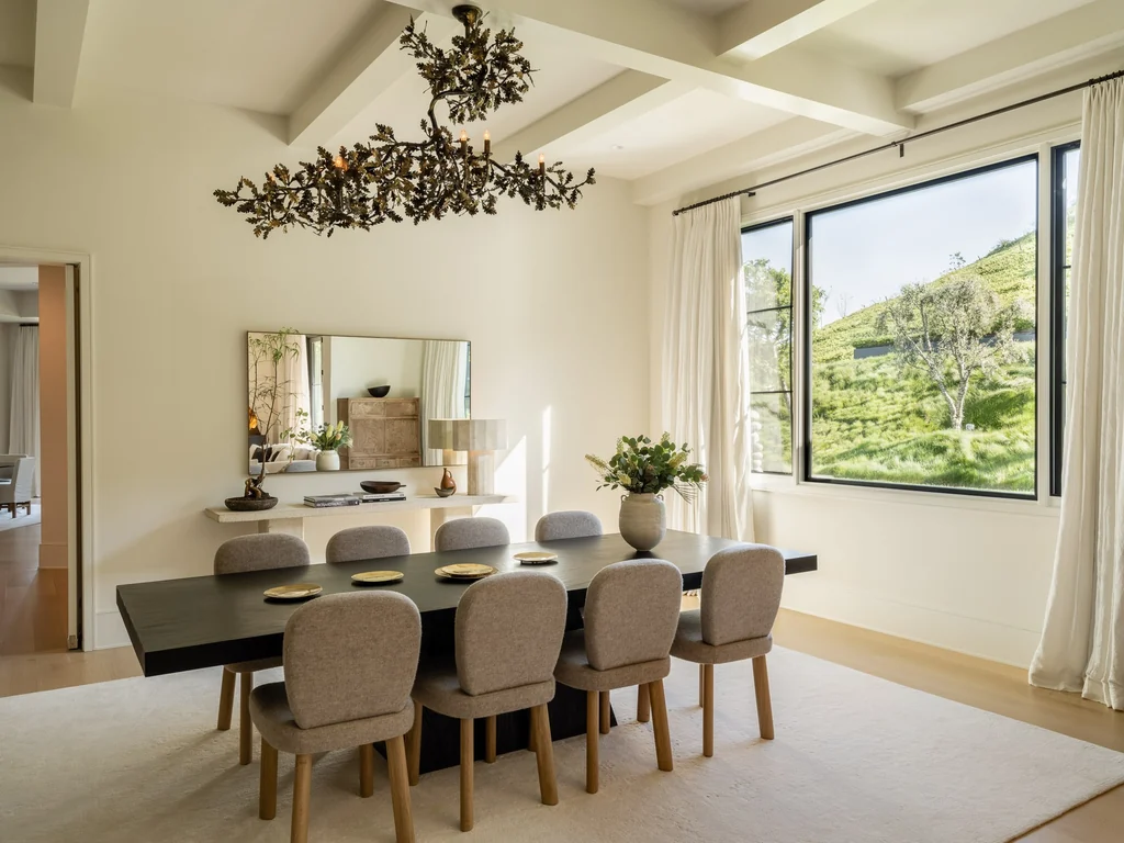 25211 Jim Bridger Rd – Formal Dining Room 25211 Jim Bridger Rd, Hidden Hills: the dining room pairs a beamed ceiling with views of the hills.