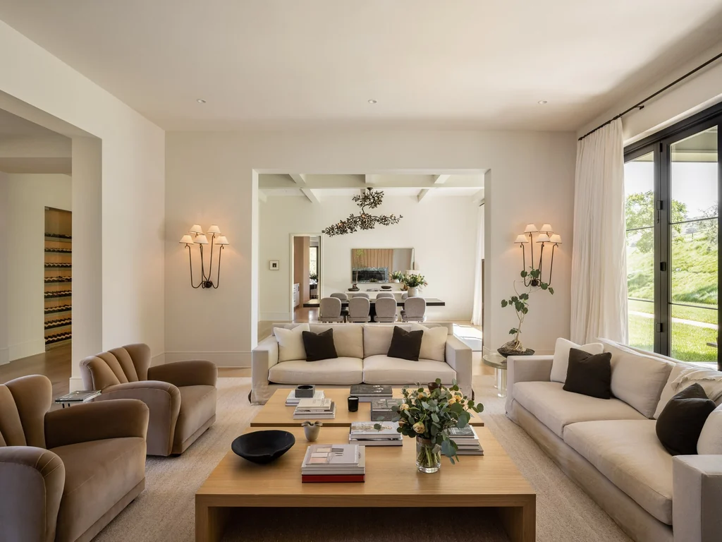 25211 Jim Bridger Rd – Formal Living Room 25211 Jim Bridger Rd, Hidden Hills: the formal living room is arranged around a fireplace.