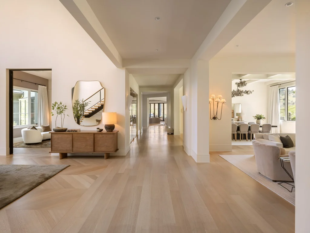 25211 Jim Bridger Rd – Gallery Hall 25211 Jim Bridger Rd, Hidden Hills: a broad gallery connects the main living spaces.