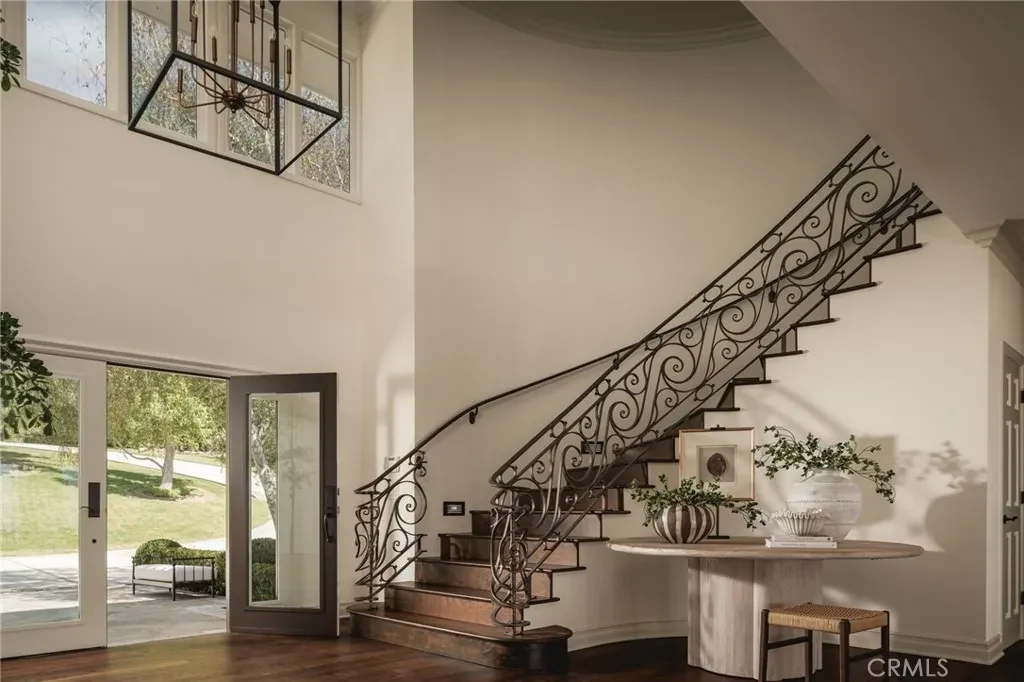 3201 Campanil Dr – Grand Staircase 3201 Campanil Dr, Santa Barbara: an ornamental iron staircase defines the entrance hall.