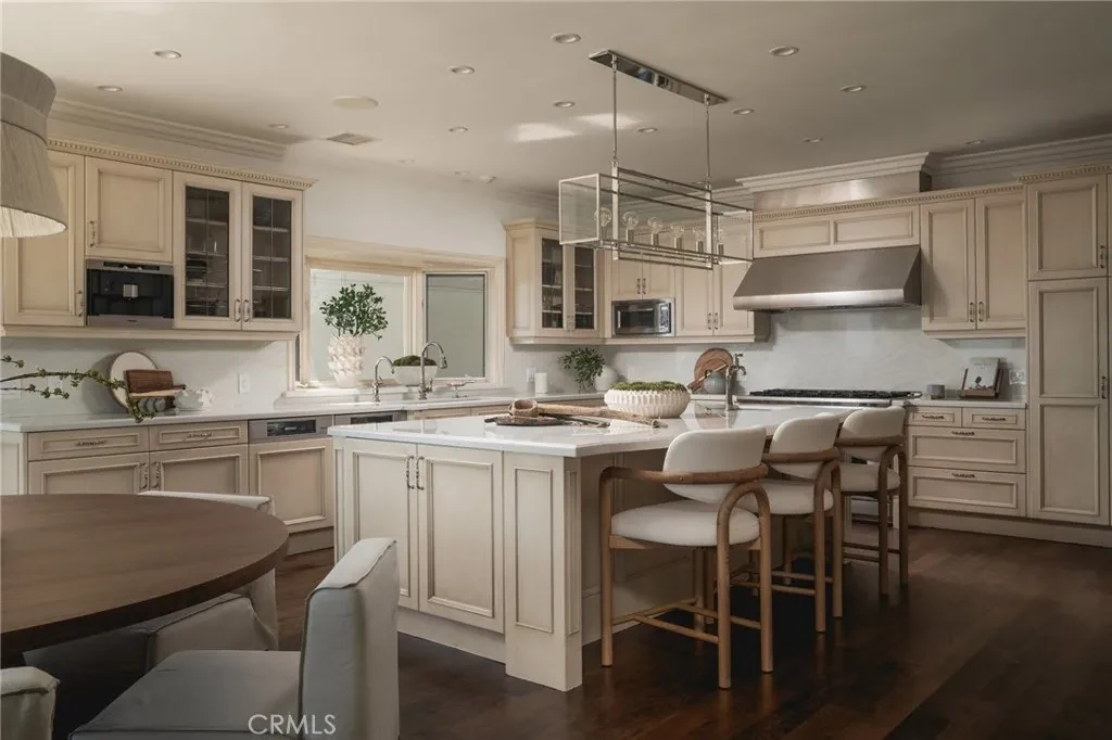 3201 Campanil Dr – Island Kitchen 3201 Campanil Dr, Santa Barbara: a large island anchors the kitchen beneath a rectangular light fixture.