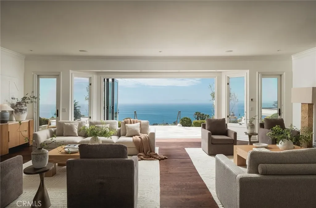 3201 Campanil Dr – Ocean View Living Room 3201 Campanil Dr, Santa Barbara: the living room opens through broad glass walls toward the Pacific Ocean.