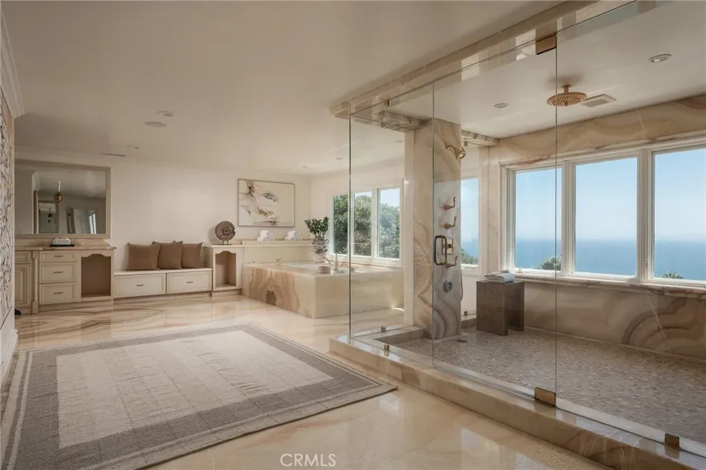 3201 Campanil Dr – Primary Bathroom 3201 Campanil Dr, Santa Barbara: the primary bathroom includes extensive stone finishes and broad windows.