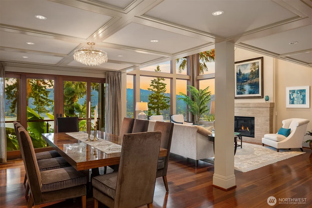 Pocket Doors Open to a Lake-View Pavilion at This Sammamish Estate Asking $6,880,000 6 Dining room with a coffered ceiling beside the great room