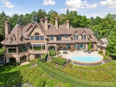 Wayzata Bay Estate With an Octagonal Great Room and 216 Feet of Shoreline Asks $16,450,000 1 The lakeside elevation brings together the stone residence, terraced gardens and pool at 358 Ferndale Rd S, Wayzata