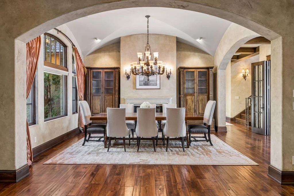 Wayzata Bay Estate With an Octagonal Great Room and 216 Feet of Shoreline Asks $16,450,000 10 The formal dining room sits beneath a chandelier and a broad arched opening at 358 Ferndale Rd S, Wayzata