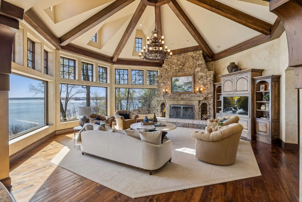 Wayzata Bay Estate With an Octagonal Great Room and 216 Feet of Shoreline Asks $16,450,000 6 Exposed beams and a stone fireplace give the great room its architectural scale at 358 Ferndale Rd S, Wayzata