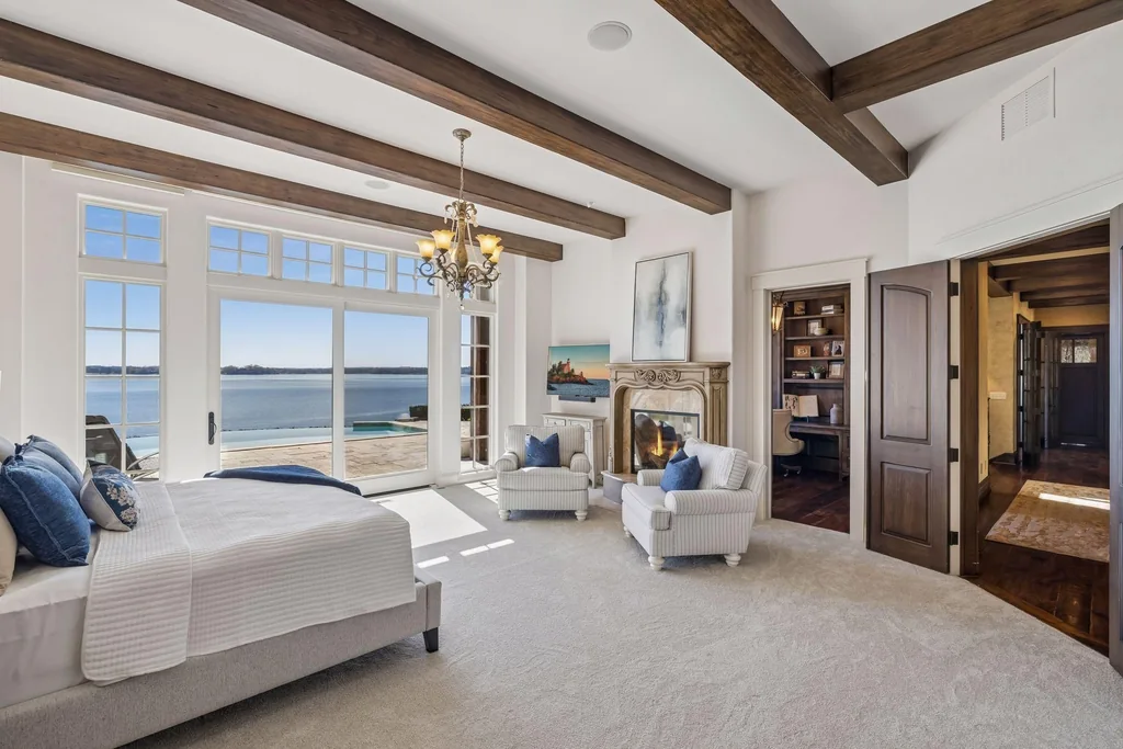 Wayzata Bay Estate With an Octagonal Great Room and 216 Feet of Shoreline Asks $16,450,000 12 A main-level primary suite combines a sitting area with lake views at 358 Ferndale Rd S, Wayzata