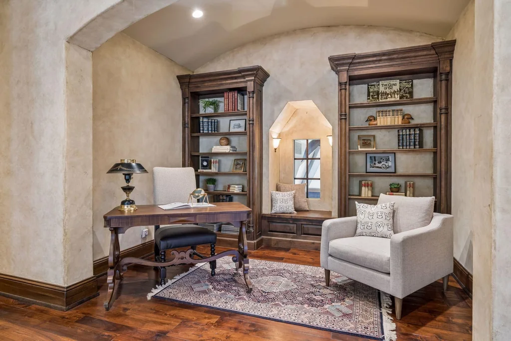 Wayzata Bay Estate With an Octagonal Great Room and 216 Feet of Shoreline Asks $16,450,000 15 A furnished reading nook occupies a quieter corner of the upper floor at 358 Ferndale Rd S, Wayzata