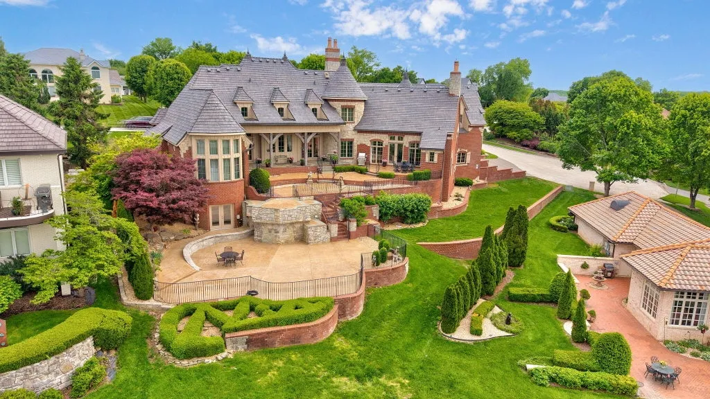 Timeless Springfield Golf Estate with a Three-Tier Terrace Facing the 9th and 18th Greens Lists for $2,995,000 2 3865 E Eaglescliffe Drive Springfield MO07