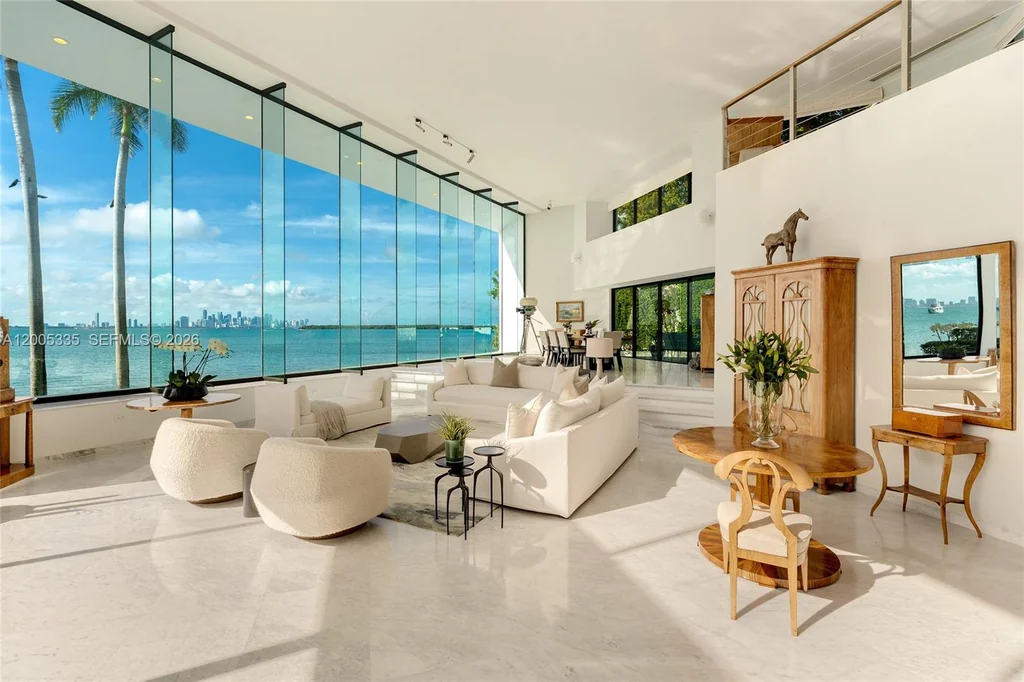 485 W Matheson Dr – Double Height Living Room 485 W Matheson Dr, Key Biscayne: double-height glazing frames Biscayne Bay from the living room.