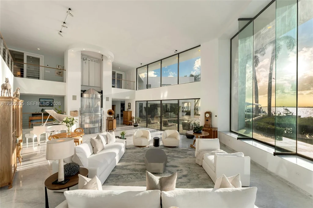 485 W Matheson Dr – Living Room Glass Elevator 485 W Matheson Dr, Key Biscayne: the expansive living room incorporates the glass elevator.