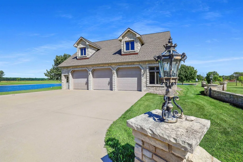 Lakefront Green Bay Estate with an Indoor Pool and Wood-Fired Pizza Oven Lists for $2,600,000 25 5696 School Dr Green Bay WI 5431313