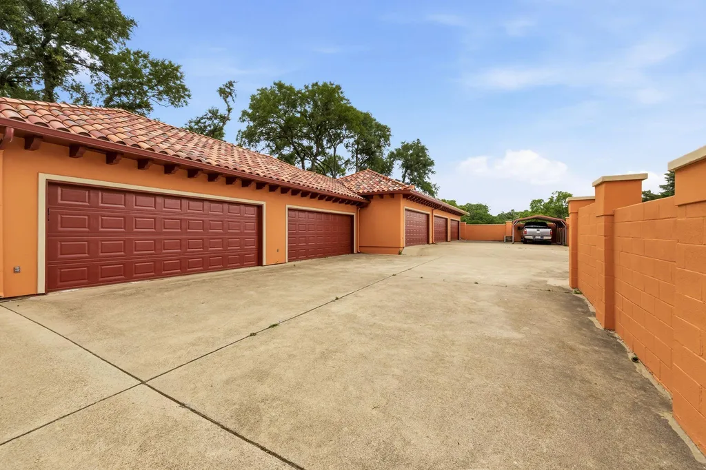 Secluded Plano Estate With a 20-Car Garage and Private One-Acre Pond Lists for $21,500,000 21 5817 Red Wolf Ln Plano TX 7509333