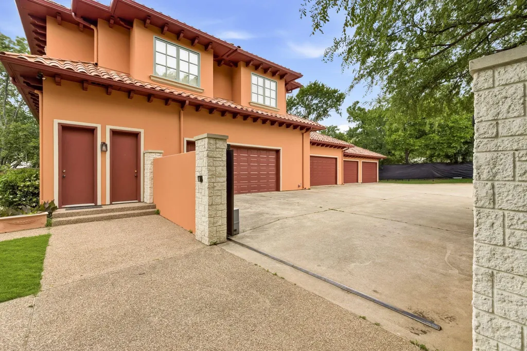 Secluded Plano Estate With a 20-Car Garage and Private One-Acre Pond Lists for $21,500,000 22 5817 Red Wolf Ln Plano TX 7509334