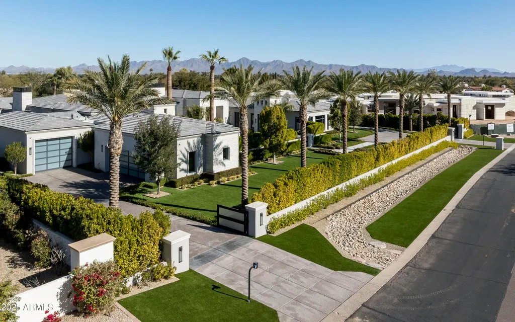 Single-Level Paradise Valley Estate With a Private Fitness Building and Six-Car Garage Lists for $23,250,000 25 6540 E CHOLLA Drive Paradise Valley AZ40