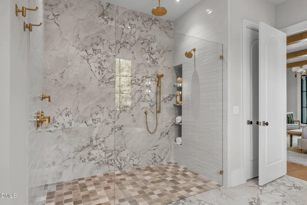 Primary Zero Entry Shower | 6744 Brixley Crest Ct The primary suite includes a generously proportioned zero-entry shower at 6744 Brixley Crest Ct, Raleigh.
