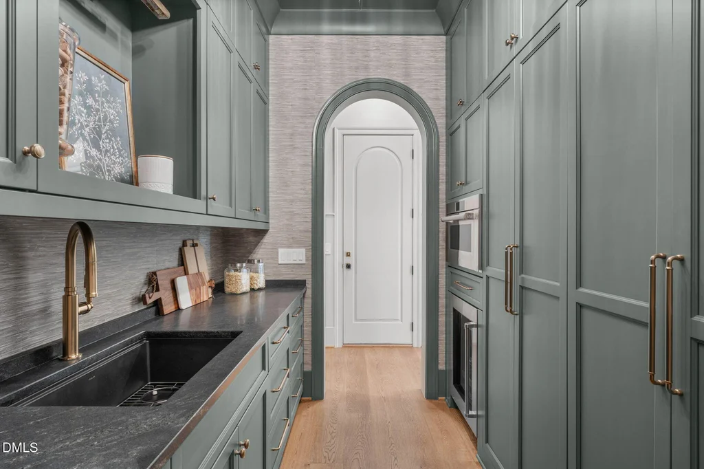 Scullery Coffee Bar | 6744 Brixley Crest Ct A separate scullery provides additional preparation and storage space at 6744 Brixley Crest Ct, Raleigh.
